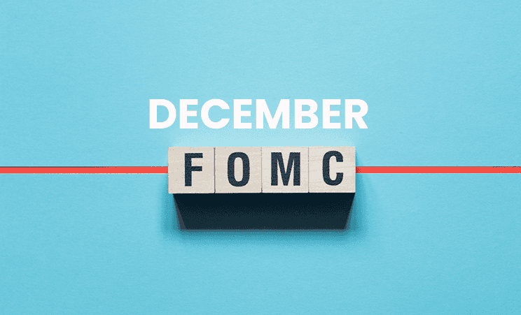 'December FOMC' text displayed on light blue background.